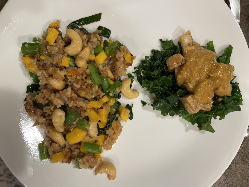 mango fried rice and peanut curry sauce tofu